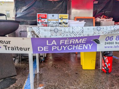 France, 27 September 2024 : French market stall with condiments and food preparation items clipart