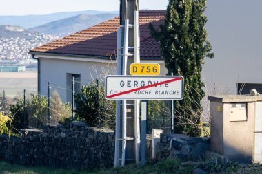 France, 01 January 2025 : End of Gergovie town sign with mountainous backdrop views clipart