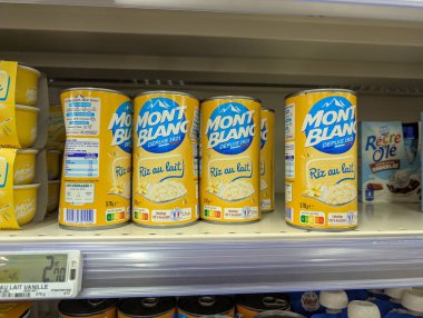 France, 12 December 2024 : Cans of rice pudding displayed on supermarket shelf with price clipart