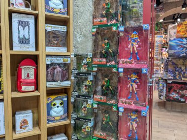 France, Lyon 04 February 2025 : Harry Potter Merchandise, Action Figures, Popular Culture Collectibles Displayed Together clipart