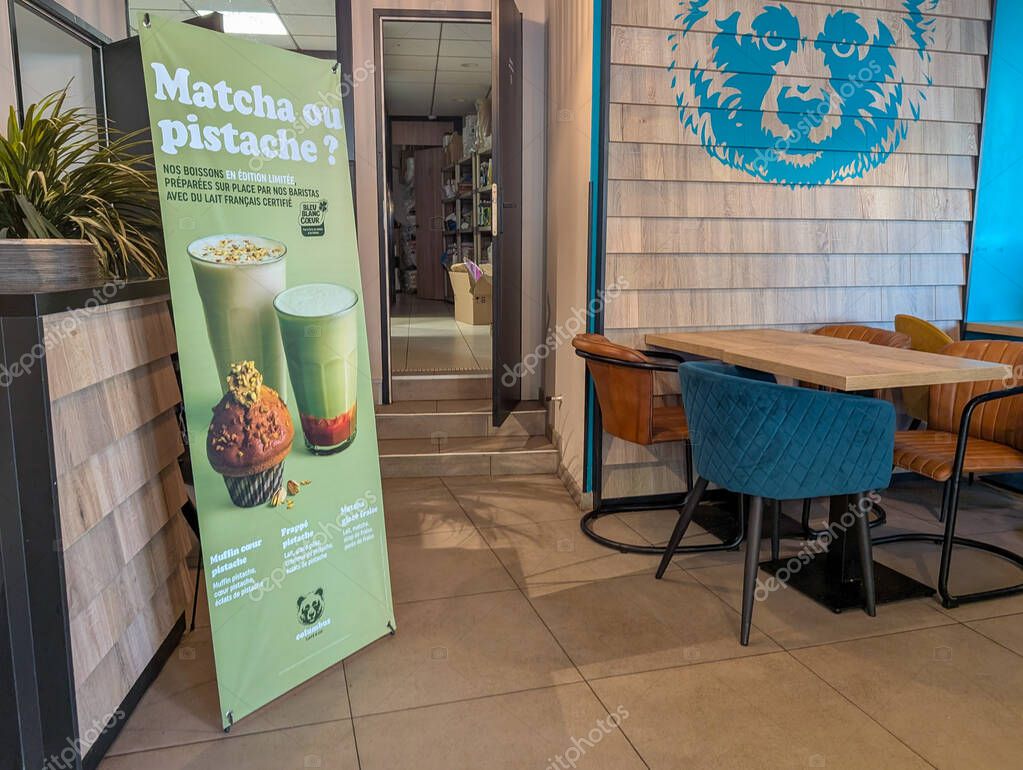 France, 08 April 2025 : Cozy Cafe Corner Featuring Matcha Or Pistachio Beverage Choices