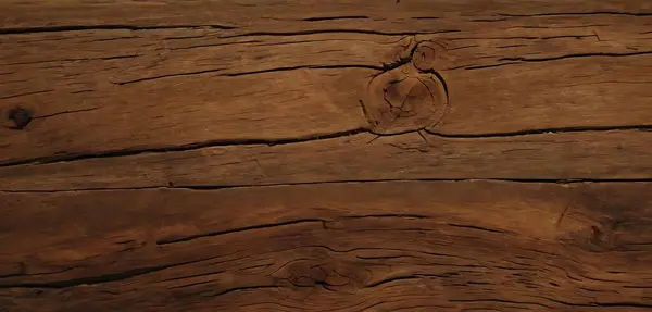 Kahverengi ahşap kaplama. Koyu ahşap arka plan. en üstteki görünüm