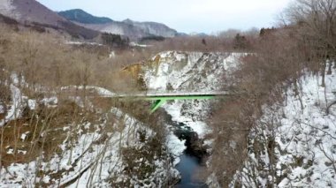 a small river in the snow