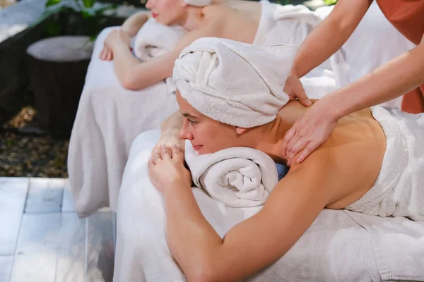 caucasian white woman relaxing in spa massage