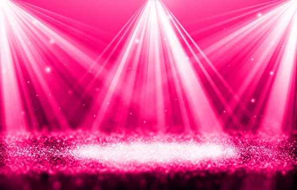 Pink sparkle rays glitter lights with spotlight bokeh elegant show on stage abstract background. Dust sparks background.Spotlight background