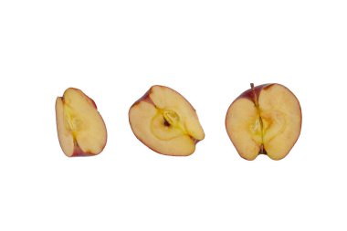 Falling red apple slice isolated on white background.