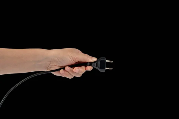 Elektrisk Kontakt Svart Bakgrund Hand Med Plugg Isolerad Svart Bakgrund — Stockfoto