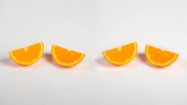 Portakal dilimi izole edildi. Turuncu meyve yarısı ve dilimler beyaz arkaplanda..