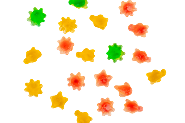 Çeşit çeşit şekerleme, sulu renkli jöleli şekerler. Şeffaf arkaplanda şekerleme