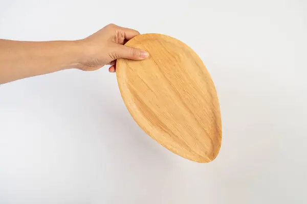 Beyaz arka planda Oval ahşap plaka