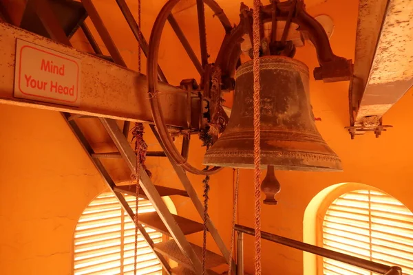 Bell inside the staircase of the bell tower of the St John the Baptist Church in Madaba, Jordan 2021