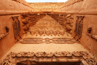 The elaborate patterns and details carved into the majestic ottoman gate, doorway seen from the second court inside the Ishak Pasha Palace, Sarayi, Dogubeyazit, Turkey 2022 clipart