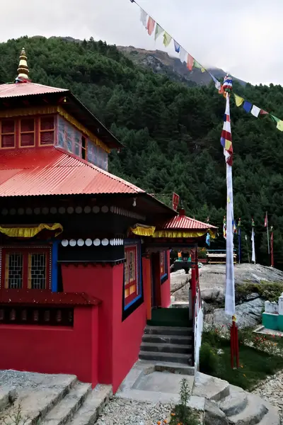 stock image The red main building of the monastery built on a hill in the Monjo, Manjo village on the Mount Everest Basecamp Trek, EBC, Nepal 2022