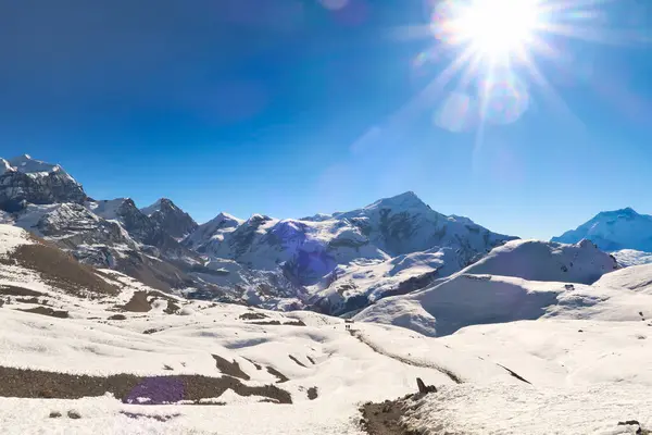 stock image View onto the trail from Thorung, Thorong High Camp to the Thorong, Thorang, Thorung La Pass, running through a snow covered landscape, Annapurna Circuit Trek, Nepal 2022