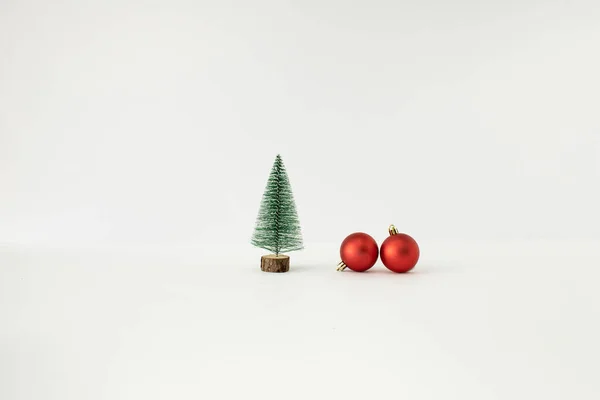 Christmas Tree Two Red Baubles White Background Minimal New Year — Stock Photo, Image