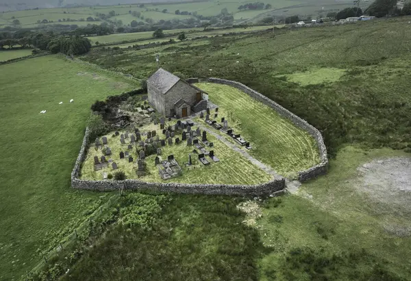 stock image Drone view of Baran Chapel, Capel Y Baran, high up on Baran Mountain overlooking the town of Pontardawe in the Upper Swansea Valley in South Wales UK