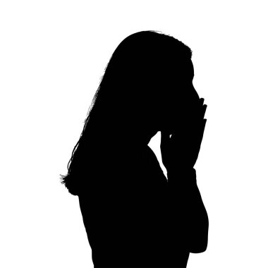 Umutsuzlukla yüzünü kapatan kadın silueti. Depresyon, üzüntü, ıstırap.