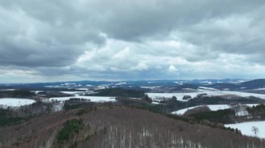 Forest mountain beech snow Bile Karpaty UNESCO snowfall biosphere reservation White Carpathians Czech meadows drone aerial hill snowy frost winter Bile Karpaty wood video shot forest virgin of Fagus