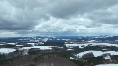 Forest mountain beech snow Bile Karpaty UNESCO snowfall biosphere reservation White Carpathians Czech meadows drone aerial hill snowy frost winter Bile Karpaty wood video shot forest virgin of Fagus