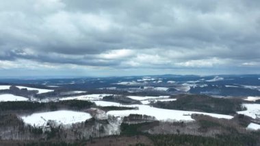 Forest mountain beech snow Bile Karpaty UNESCO snowfall biosphere reservation White Carpathians Czech meadows drone aerial hill snowy frost winter Bile Karpaty wood video shot forest virgin of Fagus