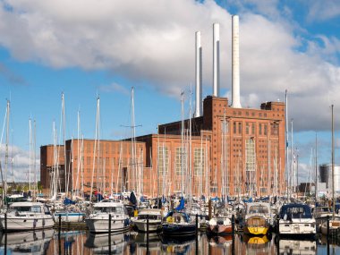 Copenhagen, Denmark - Aug 12, 2024: Svanemoelle Power Station, Svanemollevaerket, designed by Louis Hygom in 1953, district heating plant clipart