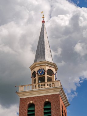 Appingedam, Netherlands - Jul 8, 2024: Bell tower of Nicolas Church, Nicolaikerk, in historic old town of Appingedam, Eemsdelta, Groningen clipart