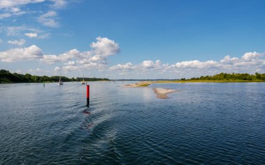 Sailing boats sailing in Dyvig Bay, an inlet of Als Sund, Als Island, South Denmark clipart