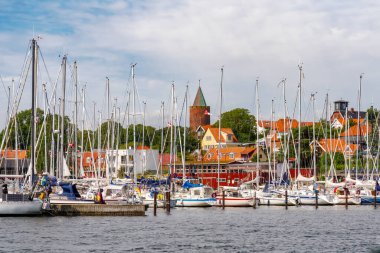 Vordingborg, Denmark - Aug 5, 2024: Marina featuring Goose Tower, historic landmark of Vordingborg, south coast of Zealand clipart