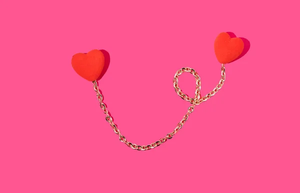 Creative Valentines Romantic Concept Two Connected Hearts Gold Chain Pink Royalty Free Stock Fotografie