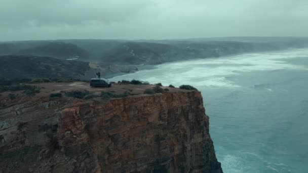 Aerial Drone Shot Couple Stand Top Adventure Van Edge Cliff — Stock Video