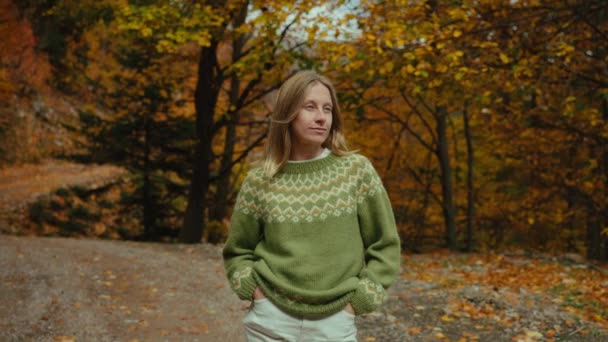 Young Woman Traditional Sweater Fall Forest Girl Look Camera Smile — Stockvideo