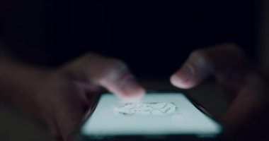 Woman use smartphone in nighttime, type text on touchscreen keyboard and swipe through photos or content on social media.
