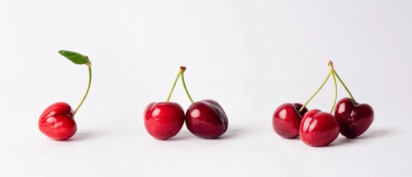 健康的红色樱桃被白色背景隔离 一套樱桃 红色水果 — 图库照片
