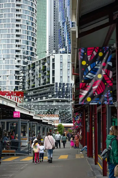 stock image MELBOURNE, AUSTRALIA - APRIL 12, 2024: People shop at the Queen Victoria Market