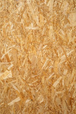 İnşaat kullanımı için yönelimli iplik (osb) doku deseninin yakın plan resmi.