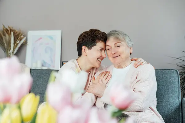 Adult Woman Hugging Delight Senior Mom Sharing Tender Moment Together — Stock Photo, Image