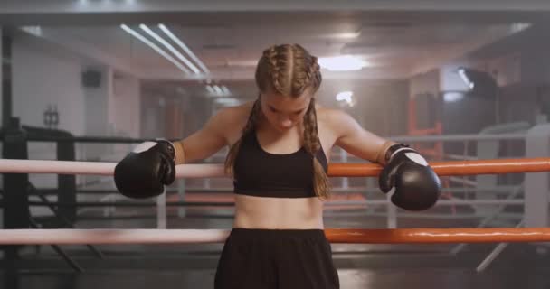 Female Fighter Stands Boxing Ring Training Looks Camera Cinematic Shots — Stock Video