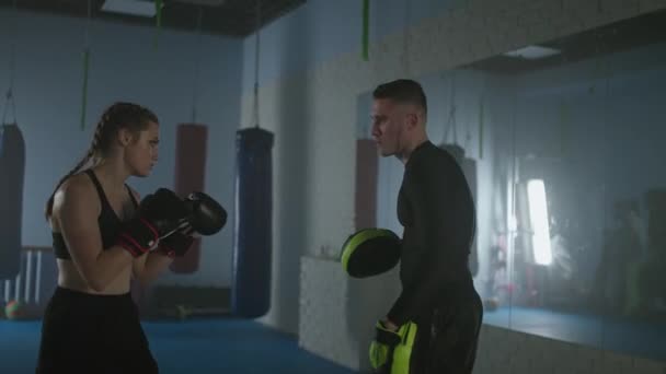Slow Motion Woman Fighter Trains Punches Defence Punching Focus Mitts — Stock Video