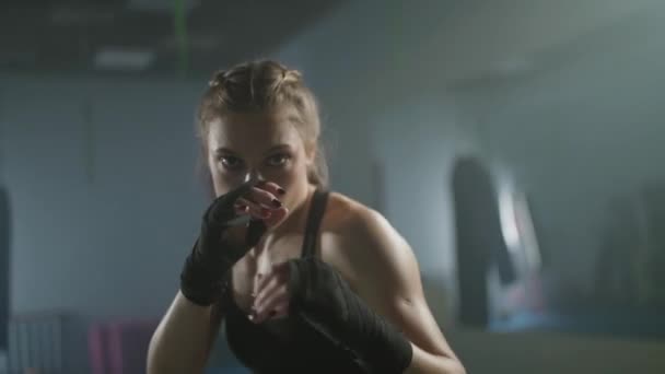 Woman Fighter Trains His Punches Looks Camera Training Boxing Gym — Stock Video