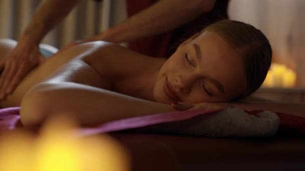 Spa Treatments Professional Masseur Makes Relaxing Back Massage Young Woman — Stock Video