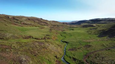 volcanic mountain valley, Iceland, northern landscape from height, beautiful view of the Iceland nature and serenity view of the earth texture, river, nature background.