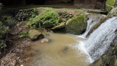 Small Stream Flowing Through Rocky Terrain in Kanheri Caves, Maharashtra