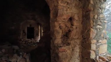 Achrol Fort, a decaying and abandoned fortress near Jaipur, Rajasthan, with crumbling walls and a haunting atmosphere