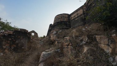 Achrol Fort, a decaying and abandoned fortress near Jaipur, Rajasthan, with crumbling walls and a haunting atmosphere