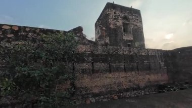 Achrol Fort, a decaying and abandoned fortress near Jaipur, Rajasthan, with crumbling walls and a haunting atmosphere