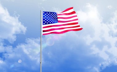 Parlak mavi gökyüzünde dalgalanan Amerika bayrağı