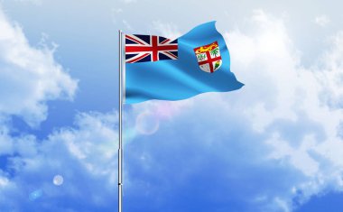 Fiji bayrağı dalgalanır parlak mavi gökyüzünde