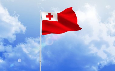 Tonga bayrağı dalgalanır parlak mavi gökyüzünde