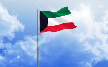 Kuveyt bayrağı mavi gökyüzünde dalgalanıyor.