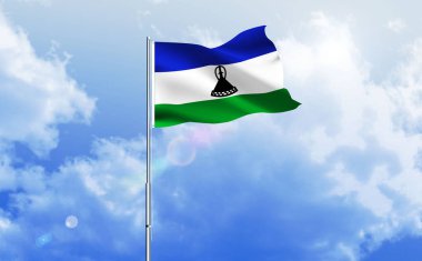 Lesotho bayrağı dalgalanır parlak mavi gökyüzünde